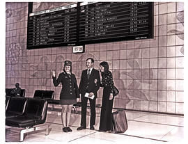 Johannesburg, 1975. Jan Smuts airport. SAR Police officer assisting passengers.