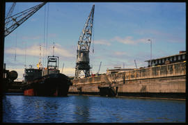 East London, March 1986. Grab dredger 'JF Craig' in graving dock in Buffalo Harbour. [T Robberts]