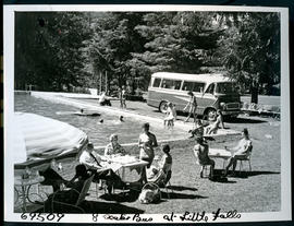 Johannesburg, 1961. SAR Chevrolet motor coach No MT6917 at Little Falls resort with group having ...