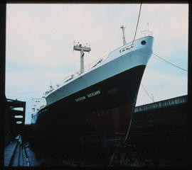 Durban, December 1970. 'Safocean Auckland' in Durban Harbour dry dock. [D Lee / S Mathyssen]