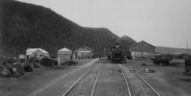 Nelspoort, 1895. Train with Cape 6th Class locomotive in station. (EH Short)