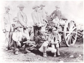 Circa 1900. Anglo-Boer War. Group of burghers at cannon.