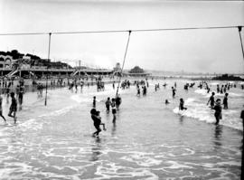Port Elizabeth, 1930. Bathers in the water at Humewood beach.