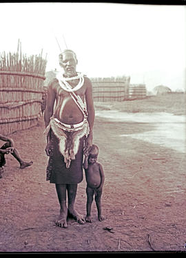 "Swaziland, 1933. Swazi induna with his grandchild."
