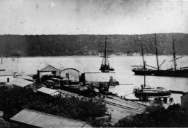 Durban. The first railway station at the Point with sailing vessels in the the harbour.