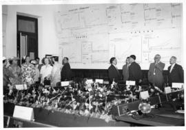 Lourenco Marques, Mozambique, 1959. Conference of General Managers. Conference room with floral a...