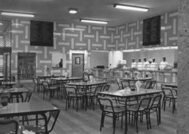 April 1961. Opening of cafeteria on non-european concourse, showing dining tables and kitchen staff.