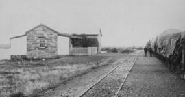 Spytfontein, 1895. Goods train at station building. (EH Short)