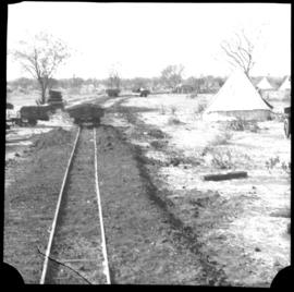 Construction camp alongside railway track.