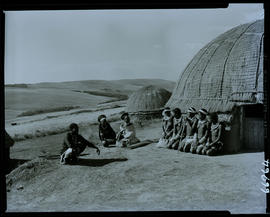 Zululand, 1957. Zulu group in front of hut.