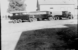 Vryburg, 1923. SAR Thornycroft truck No R22 with two other SAR Thornycroft trucks in a street nex...