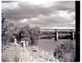"Aliwal North, 1952. Path on the bank of the Orange River with the railway bridge in the dis...