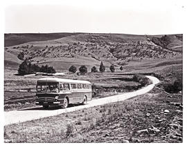 Drakensberg, 1967.  SAR Mercedes Benz tour bus No MT16949 on country road in Royal Natal National...
