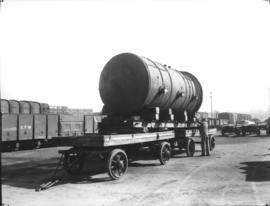 Boiler weighing over 12 tonnes on trailer with CFM goods wagon in the background.