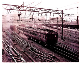 Cape Town, 1953. Suburban train leaving railway station.