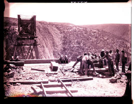 "Mossel Bay district, 1930. Construction of Gourits River bridge. Boys on winches during lau...