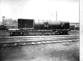 Joint NGR / CSAR well base wagon later SAR type U-1 loaded with a Mallet locomotive boiler.