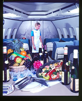 Food display and hostess in First Class section of SAA Boeing 747.