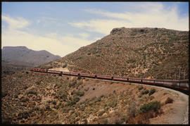 
Passenger train in open country.
