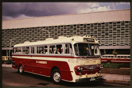 Johannesburg, 1963. SAR Nissan tour bus No MT16930 at Park station.