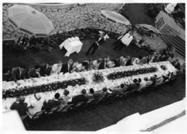 Lourenco Marques, 1959. Conference of General Managers. Large outdoor dining table with guests.