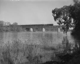 Vereeniging, 1955. SAR Class 15F with train crossing the Vaal River.