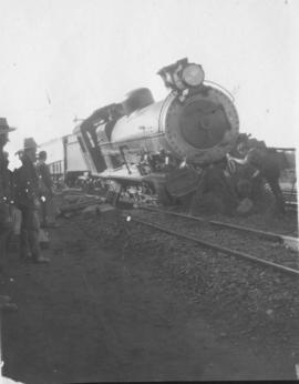 Bellville, circa 1925. Locomotive derailment.