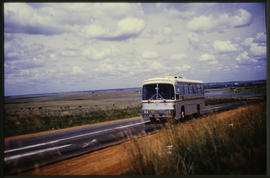 
SAR MAN-Bussing tour bus in open country.
