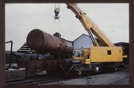 Johannesburg, 1990. Breakdown crane lifting tank for tanker wagon at Germiston.