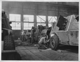 Circa 1940. Armoured military vehicle being constructed in SAR workshops during Second World War.