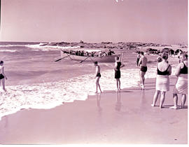 Natal South Coast, 1946. Launching rowing boat from the beach.