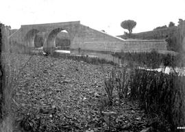 Concrete bridge with two arches near Anderson's camp.