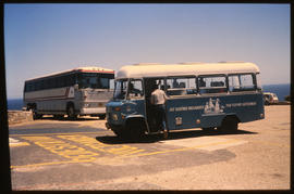 Cape Town, 1983. SAR Motor Coach Industries (MCI) tour bus No MLN321W (left) and Cape Divisional ...