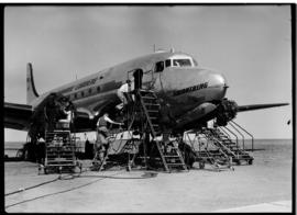 Johannesburg, circa 1949. Rand Airport. SAA Douglas DC-4 ZS-BWN 'Swartberg' being worked on on ap...