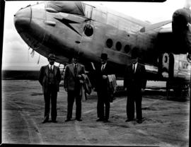 
Arrival of SAA Avro York ZS-ATP 'Springbok', four men outside aircraft. Note "Speedbird&quo...