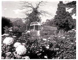 "Drakensberg, 1974. SAR MAN-Bussing MT60050 motor coach in the Cathedral Peak area."