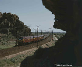 Tulbagh district, 1981. Trans Karoo Express entering Tulbaghkloof at Bushman's Rock.