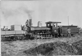Bloemfontein district, 17 December 1890. CGR Class 01 No 123 at Kaalspruit, hauling the first tra...