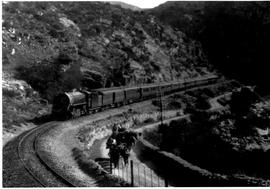 Tulbagh district, 1926. Union Express in Tulbaghkloof with mule cart on adjacent road..
