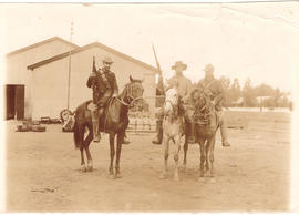 Circa 1900. Anglo-Boer War. Three armed Boer soldiers on horseback at Elandslaagte.
