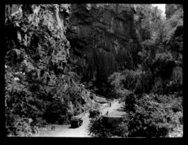 Round in Nine Tours - two vehicles before narrow gorge.