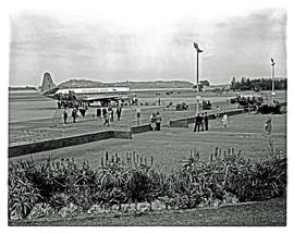 Durban, 1965. Louis Botha airport. SAA Vickers Viscount ZS-CDX 'Wildebees'. Passengers walking aw...