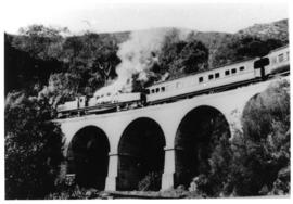 George district. Train on bridge in Montagu Pass. (Lund collection)