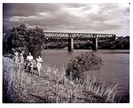 "Aliwal North, 1952. Path on the bank of the Orange River with the railway bridge in the dis...