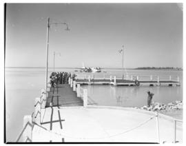 Vaal Dam, circa 1948. Arrival of BOAC Solent flying boat G-AHIN 'Southampton'. Jetty with aricraf...