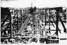 Humansdorp district, circa 1911. Gamtoos River bridge: Filling the cylinders with concrete. (Albu...