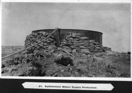 Page 32. Kalkfontein. Water tank protected by sand bags.