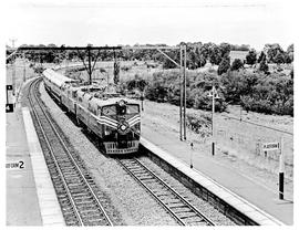 Johannesburg, 1966. Two SAR Class 5E1's with Blue Train near Johannesburg.