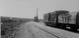 Wolwefontein, 1895. Goods train in station with water tank in the distance. (EH Short)