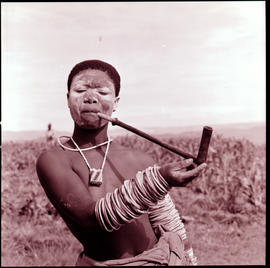 "1972. Xhosa girl smoking pipe."